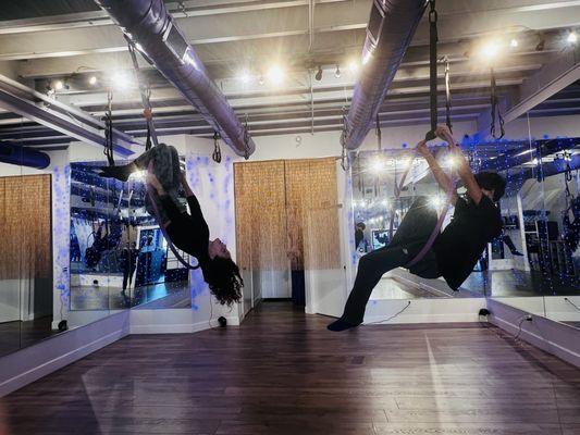 The downstairs studio with the hoops set up in this photo. They have a teen aerial class as well as adults.