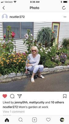 Owner, Anne, tending to the store's garden