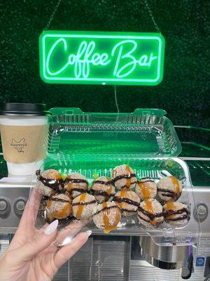 Caramel chocolate drizzled cake donut holes.