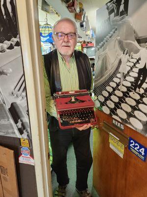 Mr. Schulze with an Olivetti Valentine