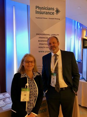 Photo of Kathy Murch and Richard Weston of Physicians Insurance attending the Massachusetts Medical Society's Annual Meeting