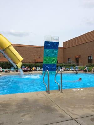 Climbing wall and drop slide.