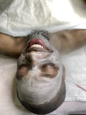 Masque during men's facial