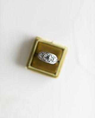 A gorgeous Authentic Art Deco vintage three stone engagement ring set in platinum!