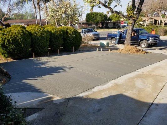 8 yards of concrete @ 3000 PSI. Broom finish and tension joints