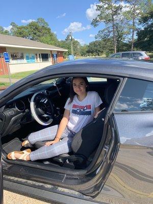 Madi in her Mustang from Hixson Ford Leesville.