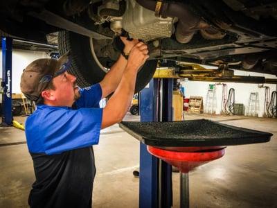 Working hard changing oil!