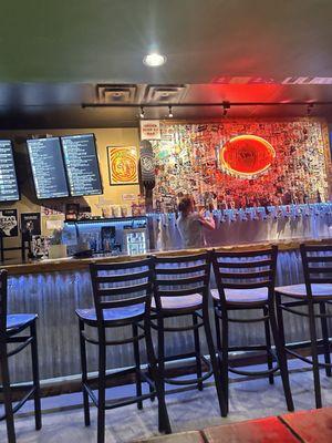 Bar area with taps and menu