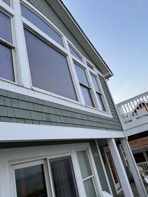 Windows from living room to ocean view.