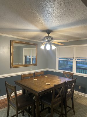 Assembled table and hung mirror