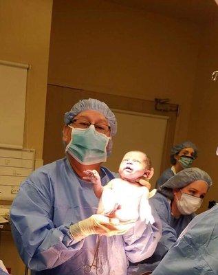 Dr. Perez delivering my son, through cesarean, at Memorial Hospital in 2016.