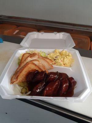 BBQ link basket with potato salad salad Texas toast BBQ links