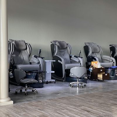 Massage chairs available at pedicure stations.