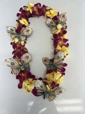 I added origami money butterflies but the lei was so beautiful by itself.