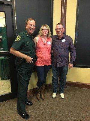 Vice President, Kenny Harp, with wife, Pamela Harp, and Polk County sheriff, Grady Judd, at the monthly TCRCA meeting