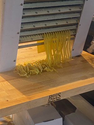 Fettuccine being cut