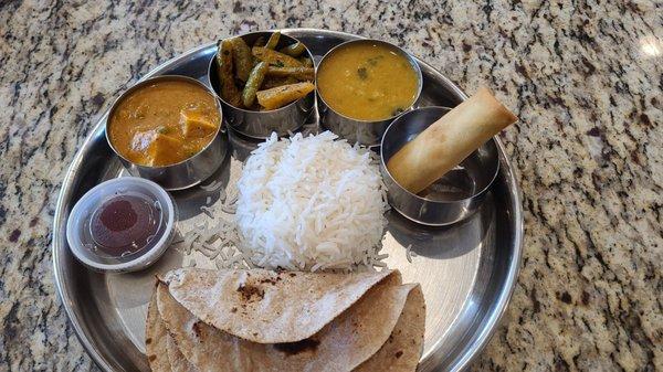 Lunch thali. Delicious curries, appetizer sprig roll and gulab jamun as desert. Thali and Samosa 2 Pcs Vegan