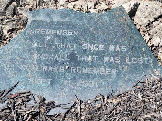 Close up of the stone that sits in front of the Flower sculpture.