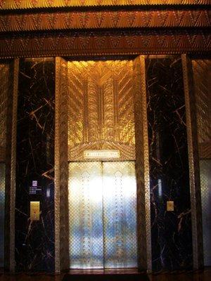 Make your way towards the cast bronze elevator fronts, and head up to the 7th floor.