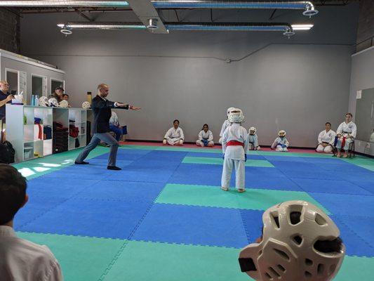 Newly minted judges practice being officiants and referees at the practice tournament