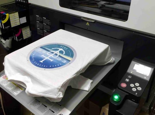 Our direct to garment printer at work.