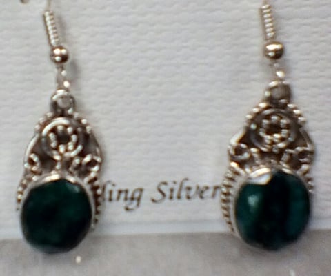 Contemporary handcrafted sterling and faceted emerald drop earrings. Not the best ever stones so unique,interesting.