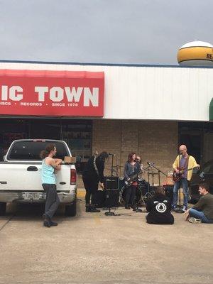 Burning Pages band played in parking lot for Rex Manning Day.