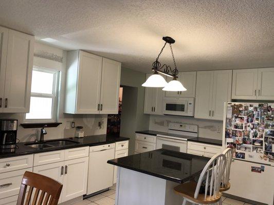 After a bit of drama (remodeling and finding surprises in soffits) I finally got me new cabinets!