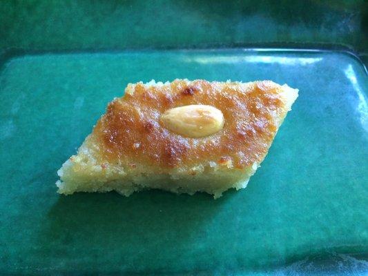 Namoura - farina cake drenched in rose-water or orange-blossom scented syrup and topped with an almond.