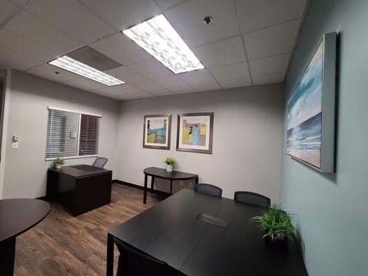 Flexible office for up to four. Great for training or online meetings/ webinars or as an executive office.