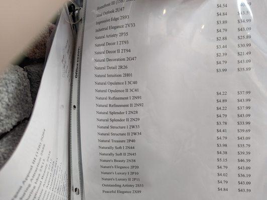 All carpets' prices are listed on sheets hanging in each manufacturer's display