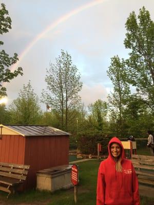 Playing through the rain, rainbow over the course