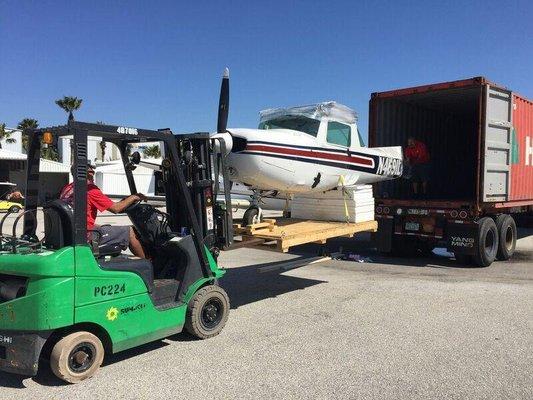 Davi & Valenti Movers Moving a Plane