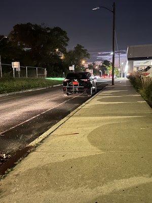 My car, outside the parking lot & unlocked. This road feeds the on-ramp for I95.