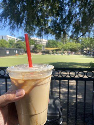 Lavender iced latte and dog watching