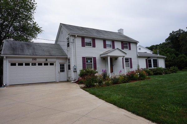 Before pic of an Agawam home we are residing, roofing and improving along the way.