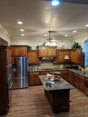 Kitchen Remodel. New Island counter, cabinets, flooring and appliances