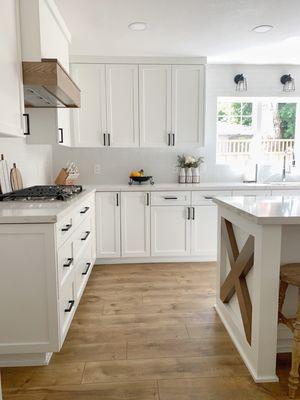 Stained oak hood trim and island accents