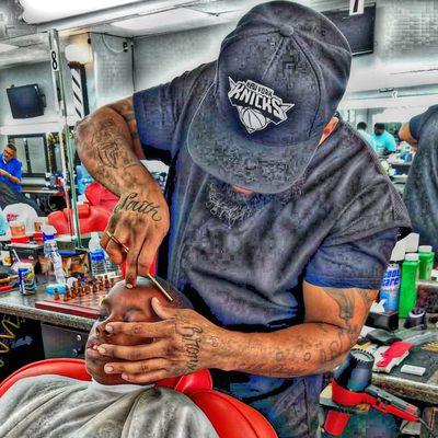 The Tonsorial Artist/Barber God Carl