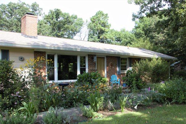 Flowers & color at the front of a home make it feel more welcoming/inviting. Great example here of one of my sold listings in Chapel Hill.