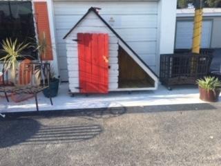 a smoker with wood storage or a puppy palace or  a pit stop for Santa garden house.....