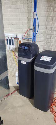 Water Softener and reverse osmosis drinking water system. Soft water and great tasting water for this home!