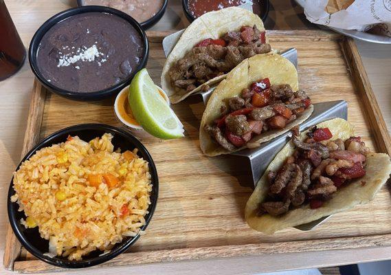 Norteno tacos with rice and beans.