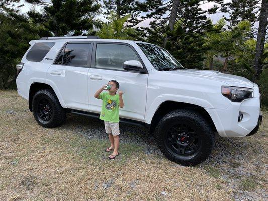 My son Greyson with his new ride to school.