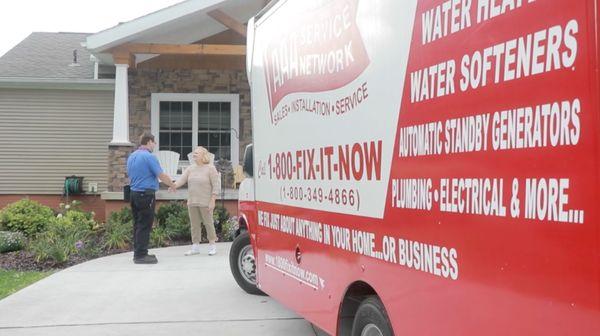 One of our professional service technicians helping a local homeowner.