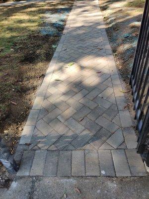 Pavers in herringbone pattern with border