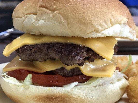 Close up of double cheeseburger.