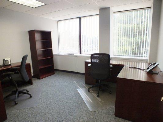 Offices with large picturesque windows.