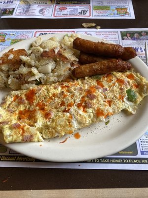 Western Omlette, potatoes with fried onion and green peppers and a side of sausage. Oh, and Tabasco on the omlette.