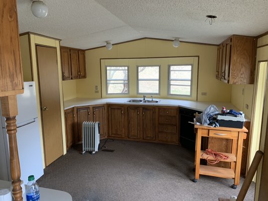 Kitchen restored also painted a yellow color